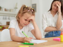 Mom is angry because her daughter dont want homework parents teaching kids home home school education mother helping her daughter homework emotional stress 215x161