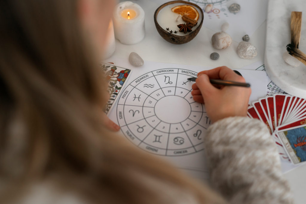 High angle woman reading tarot home 1024x683