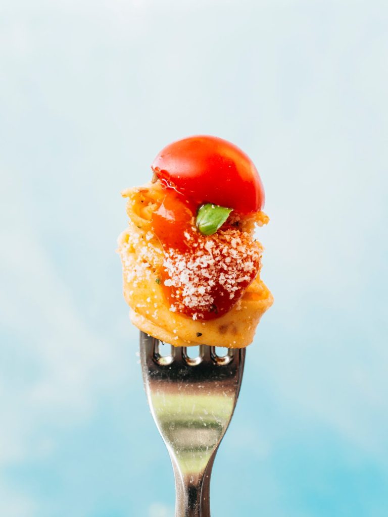 Tasty spaghetti wrapped around fork 768x1024