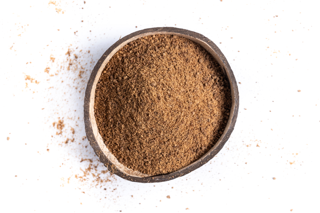 Coconut palm sugar isolated white background 1024x683