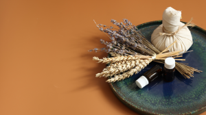 Spa composition with herbal bag natural oils jars dried flowers 300x168