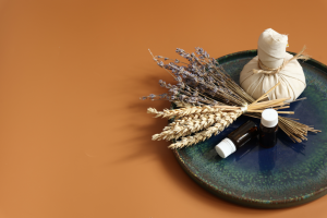Spa composition with herbal bag natural oils jars dried flowers 300x200