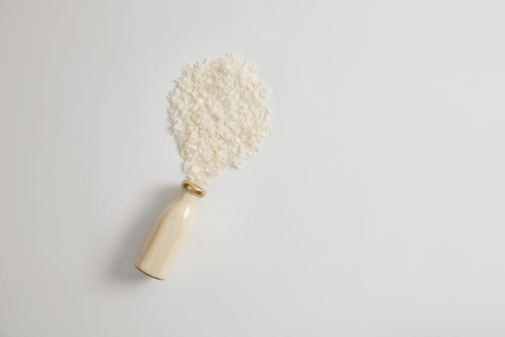 Vegan coconut milk drinking dairy alternative lactose intolerance plant based beverage rich protein calcium healthy nutrient drink copy space white background your advert 1024x683