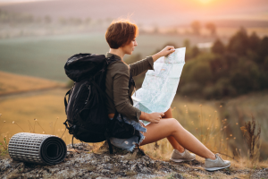 Woman travelling using map 300x200
