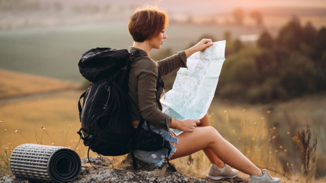 Woman travelling using map 470x264