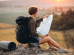 Woman travelling using map 74x55