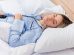 Young beautiful woman blue pajamas laying bed 74x55