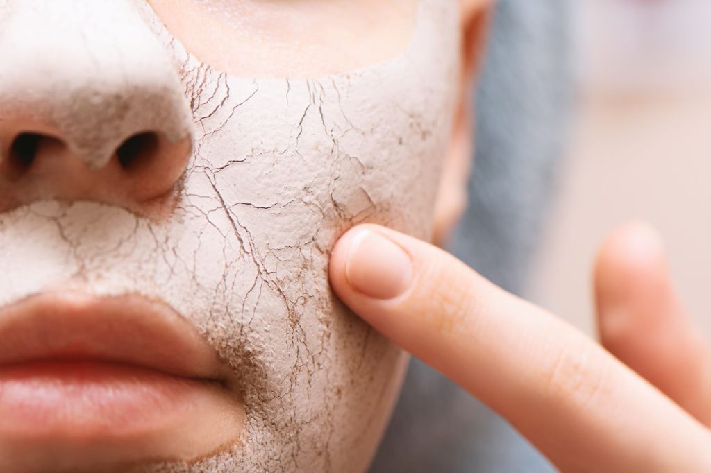 Clay facial mask female face close up 1024x682