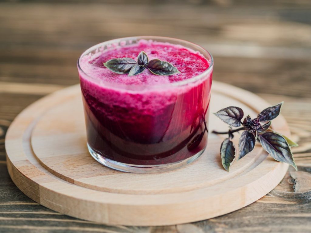 Fresh glass beetroot juice wooden tray 1024x768