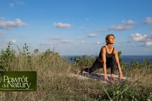 Young woman doing yoga outdoors with amazing back view bali indonesia 990x556a 300x200