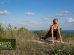 Young woman doing yoga outdoors with amazing back view bali indonesia 990x556a 74x55