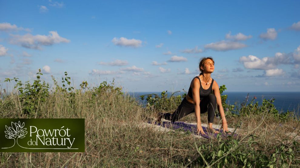 Young woman doing yoga outdoors with amazing back view bali indonesia 990x556a