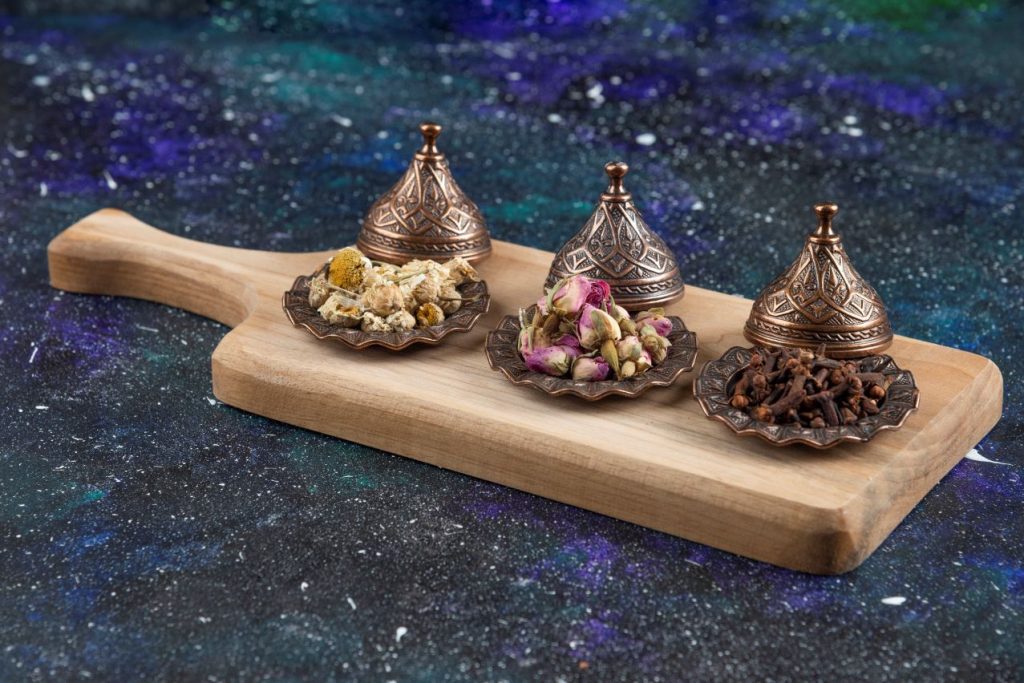 Different herbs spices wooden board 1024x683