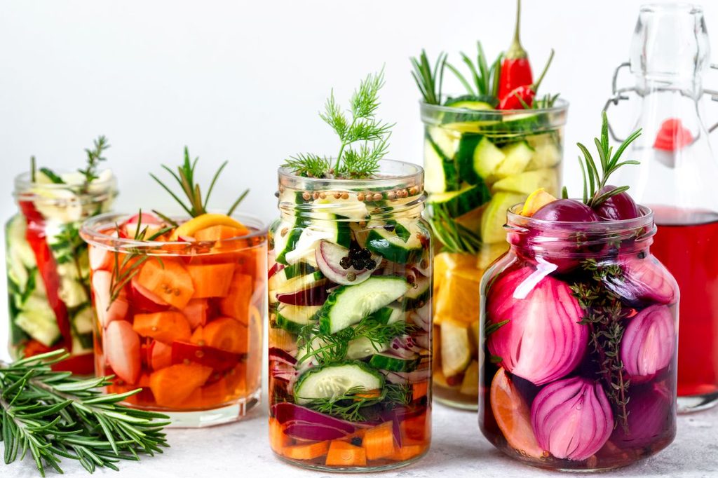 Various pickled vegetables glass jars mixed fermented vegetables 1024x682