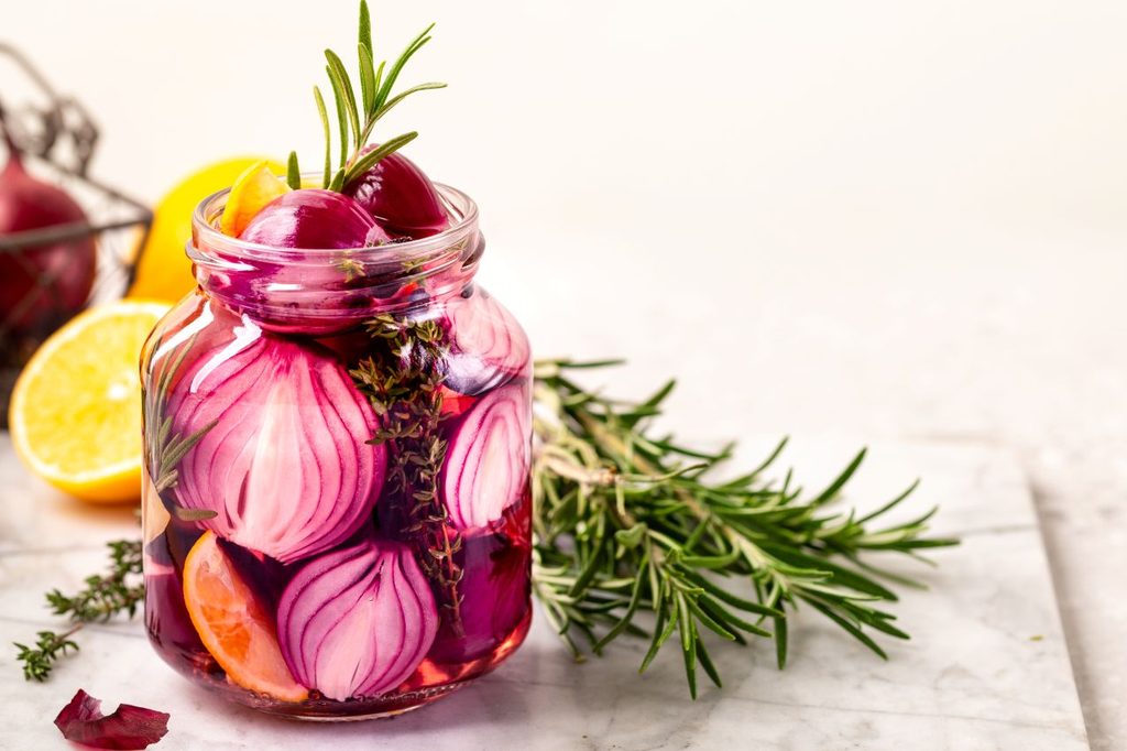 Jar pickled red onions white background concept fermented vegetarian food 1024x682